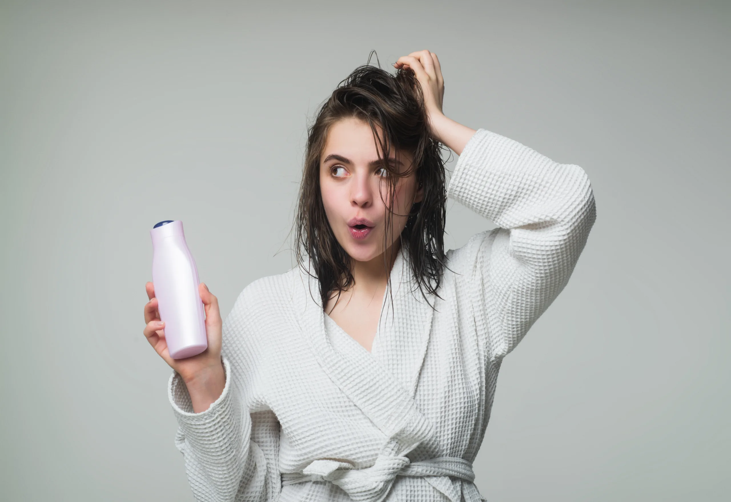 Woman looking confused about her hair