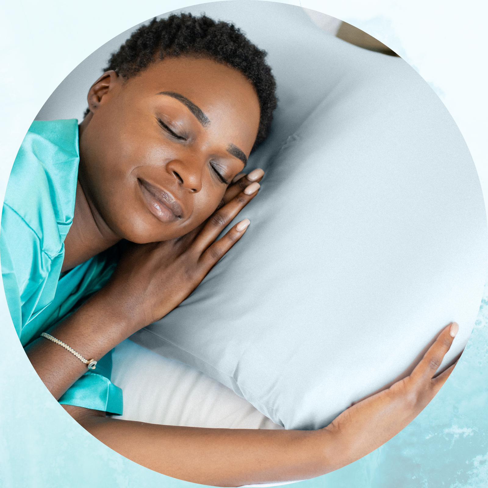 woman with fine curly coily hair sleeping on silk pillowcase by van + veronica Haircare