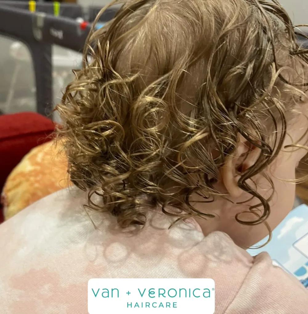 little girl with curls - results after using van + veronica The Haven Collection fragrance-free products